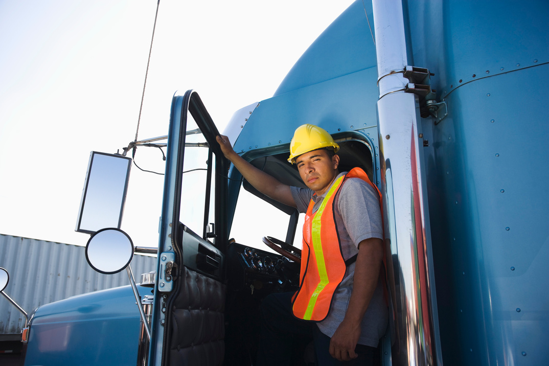 Worker with semi-truck